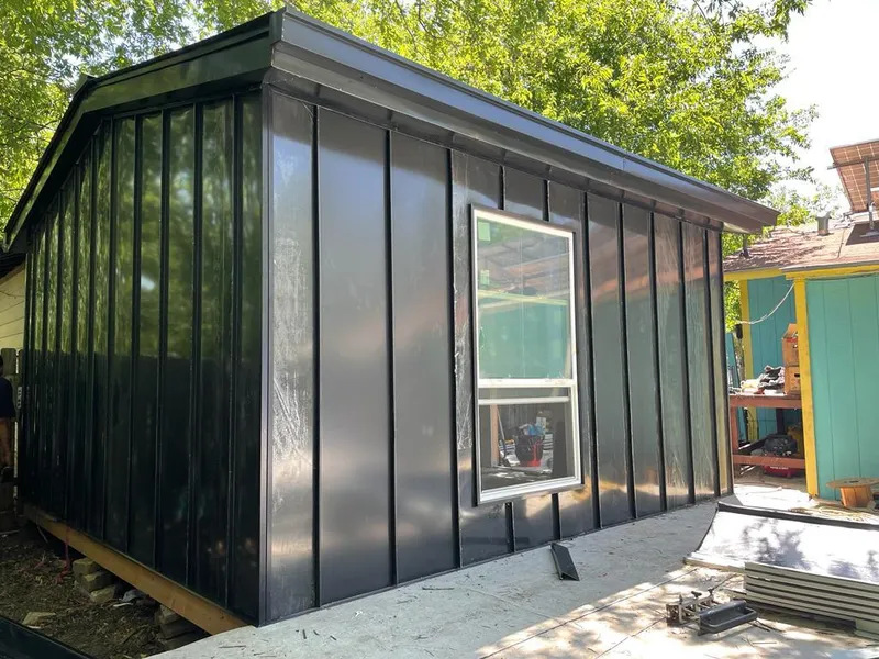 Black standing seam metal wall panels for Roof Inspection in Sauk Rapids