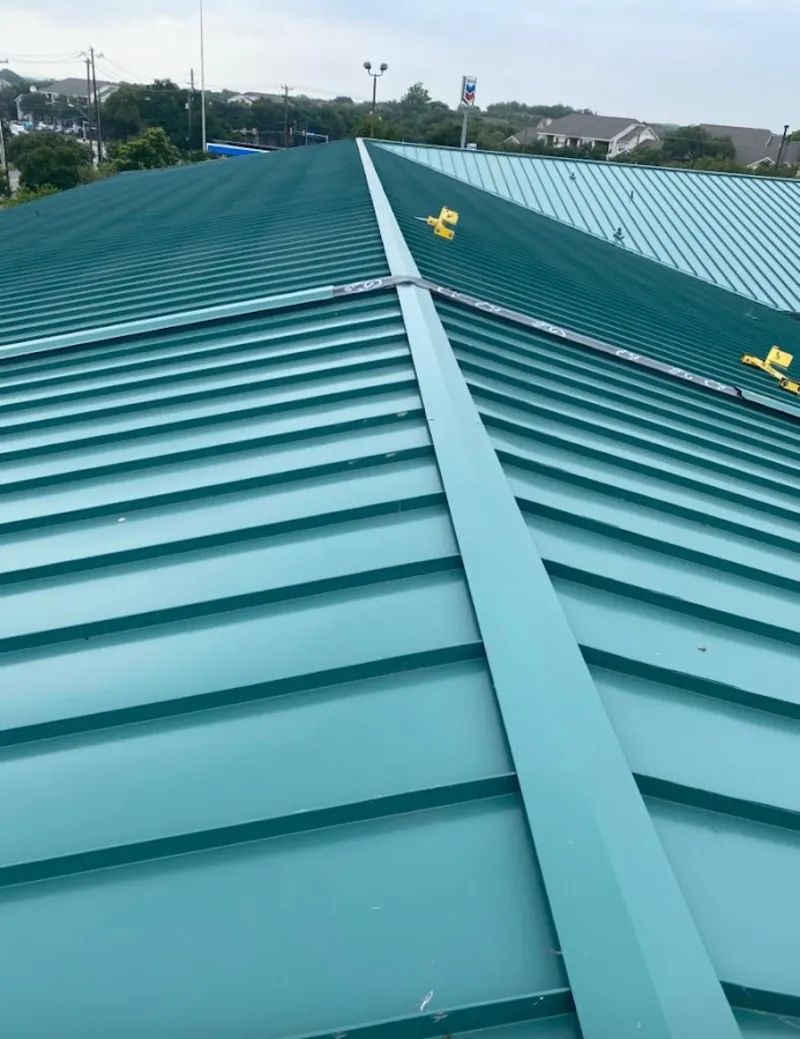 Green commercial metal roof ridge and valley for Metal Roof Repair in Sauk Rapids